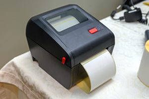 מדפסת לשדרוג העסק - כיצד מדפסת מדבקות מקצועית תשדרג את העסק שלכם?